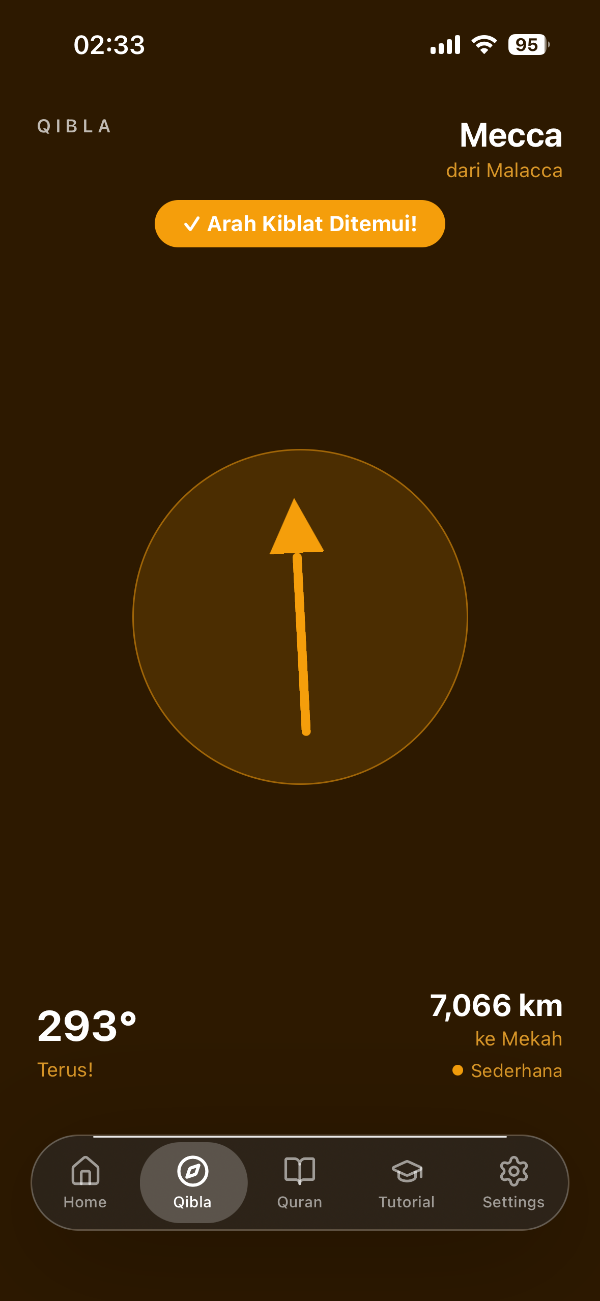 Qibla compass on dark amber theme, large arrow pointing 293 degrees toward Mecca, distance 7066 km